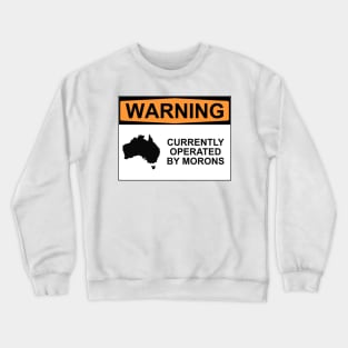 WARNING: CURRENTLY OPERATED BY MORONS Crewneck Sweatshirt